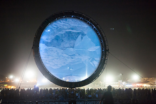 large circle over crowd with projection of ice